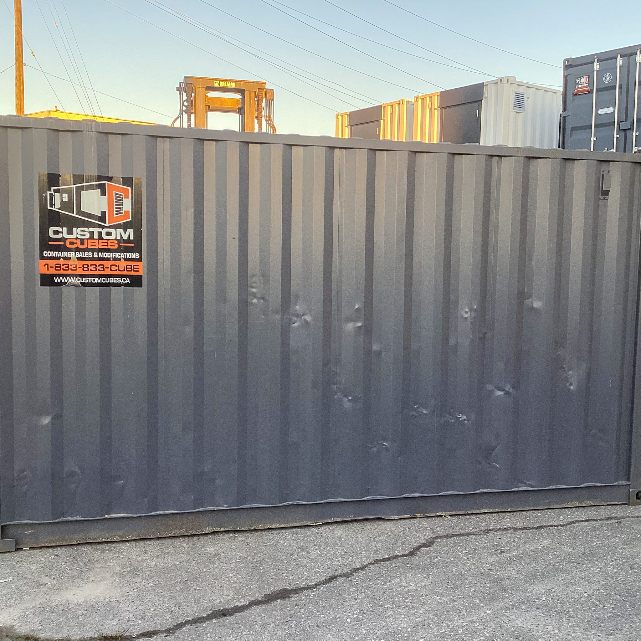 15’ Custom Modified Container – Roll-Up Door, Electrical, & Painted Finish - Custom Cubes