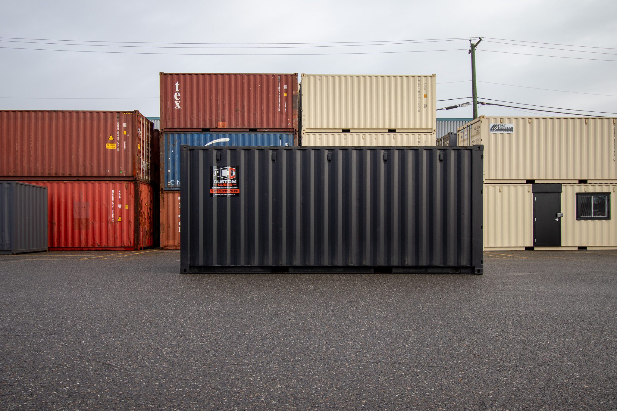 20’ New (1-trip) Container – Painted black - Custom Cubes