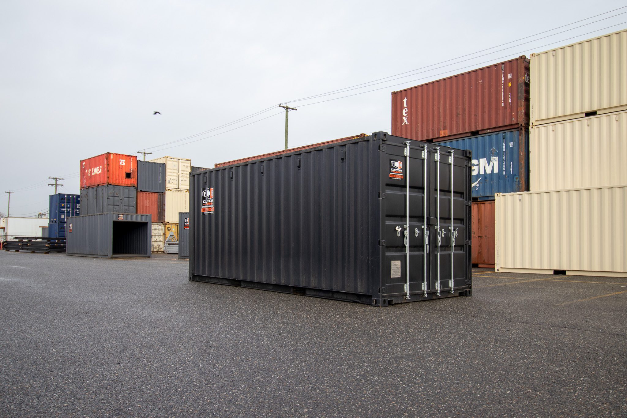 20’ New (1-trip) Container – Painted black - Custom Cubes