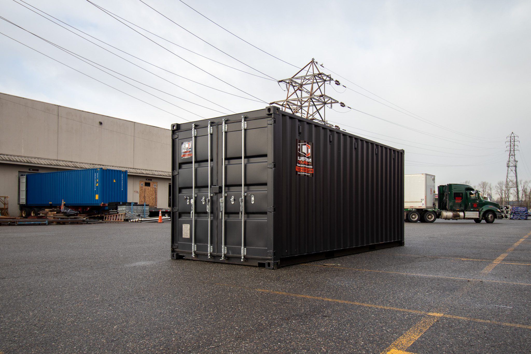 20’ New (1-trip) Container – Painted black - Custom Cubes