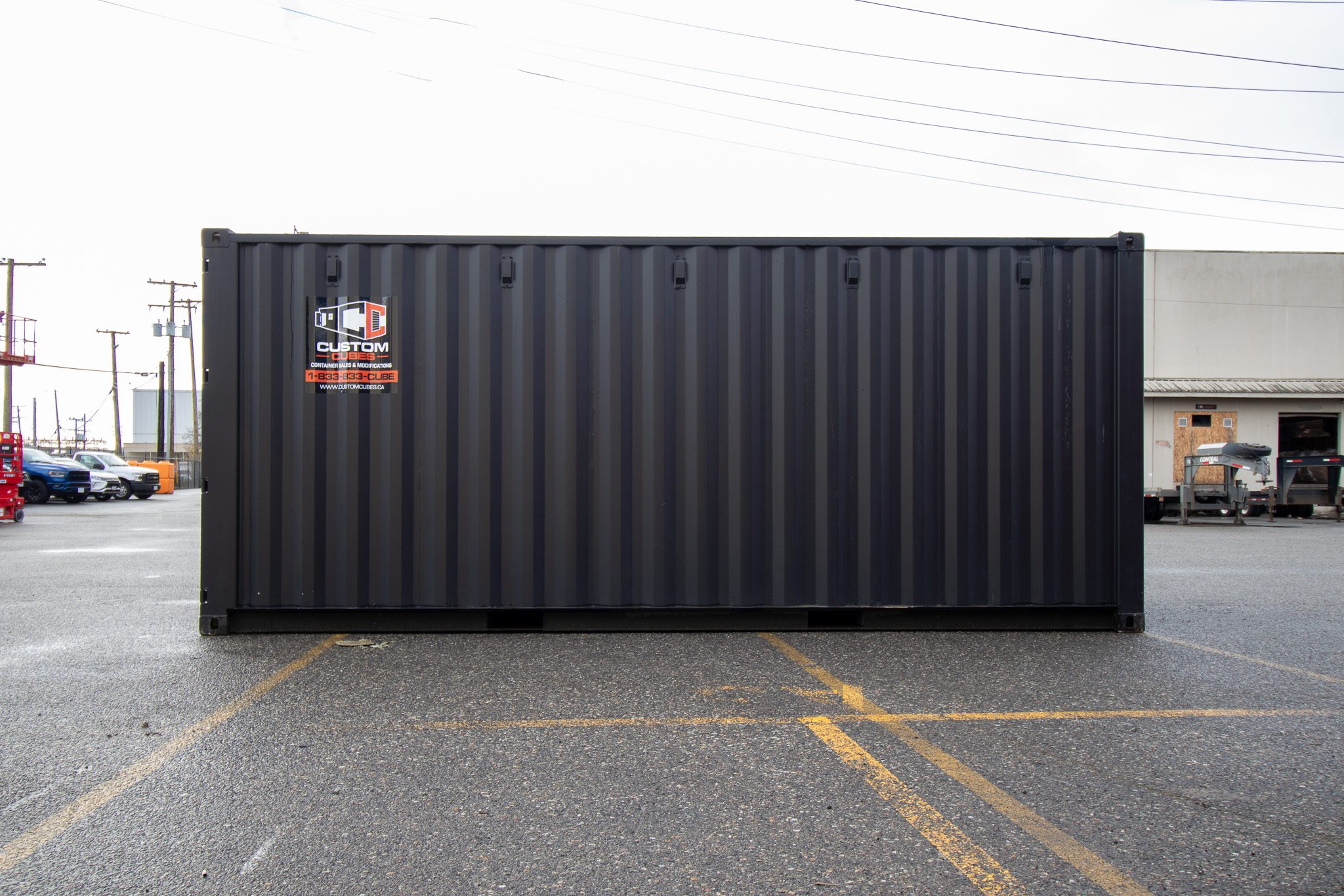 20’ New (1-trip) Container – Painted black - Custom Cubes