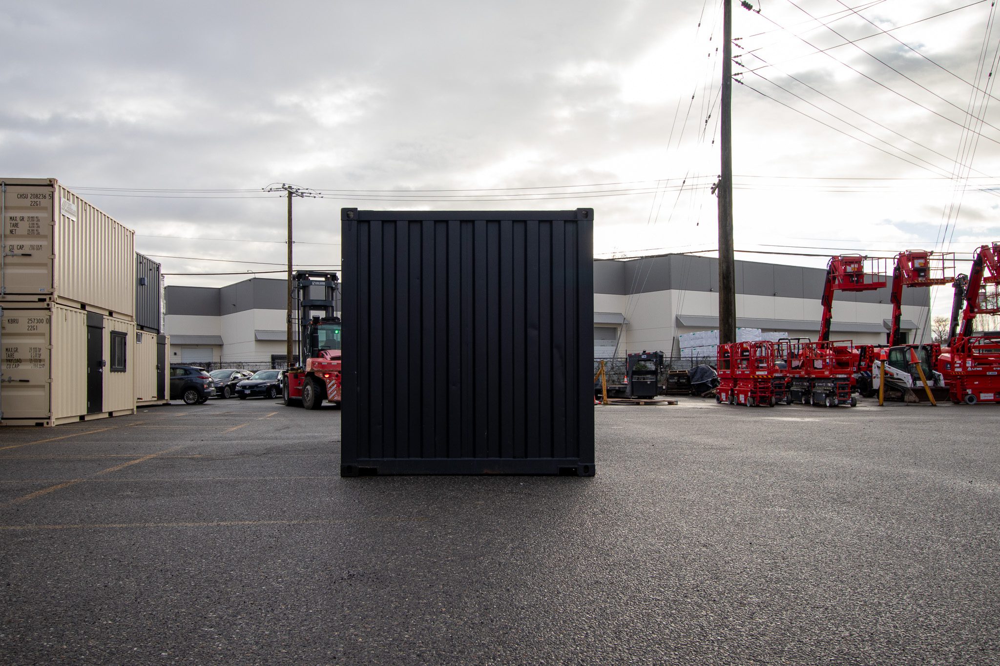 20’ New (1-trip) Container – Painted black - Custom Cubes