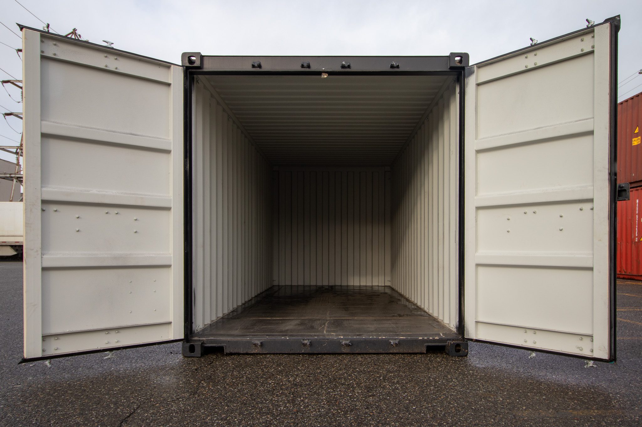 20’ New (1-trip) Container – Painted black - Custom Cubes