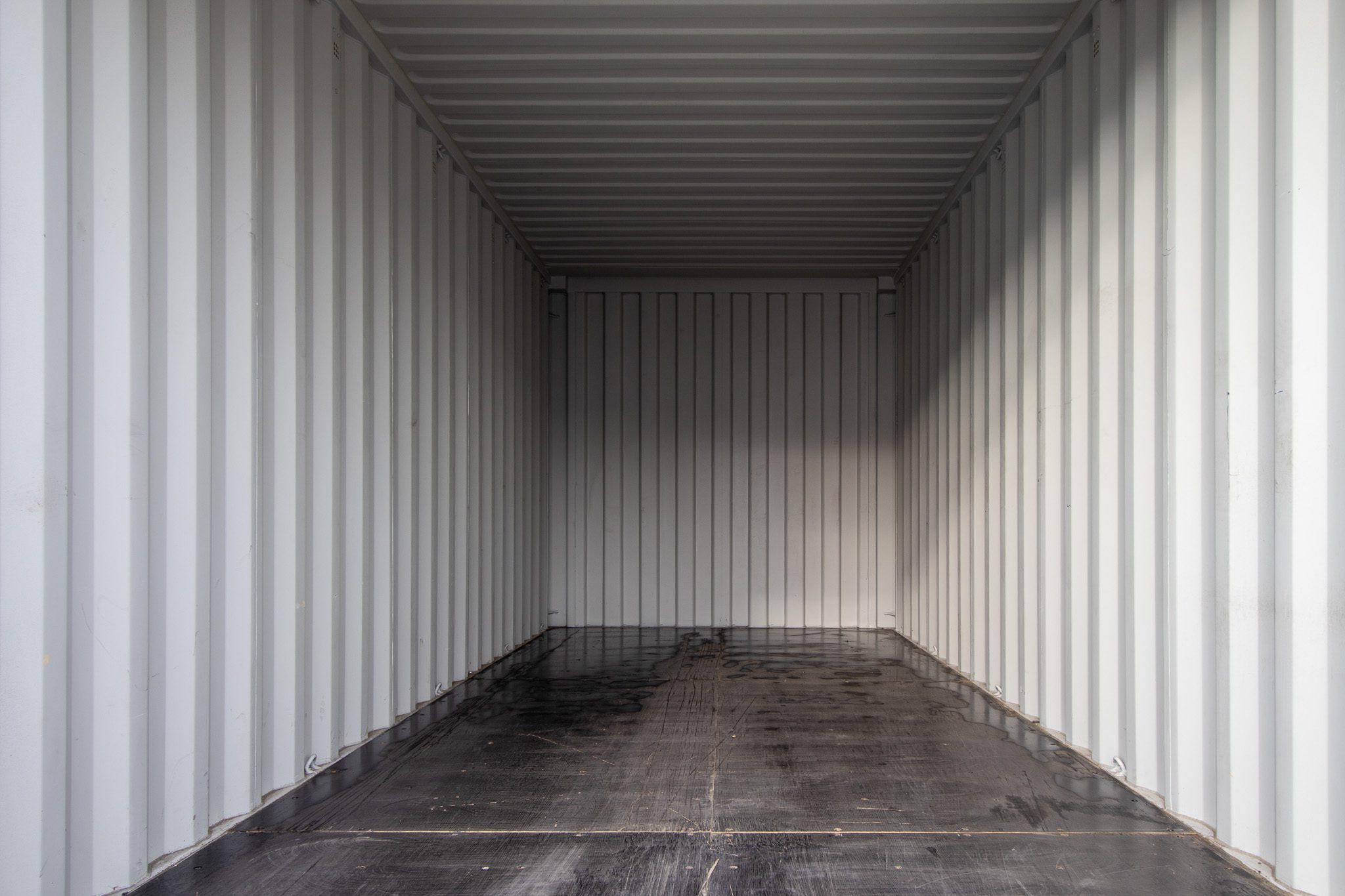 20’ New (1-trip) Container – Painted black - Custom Cubes