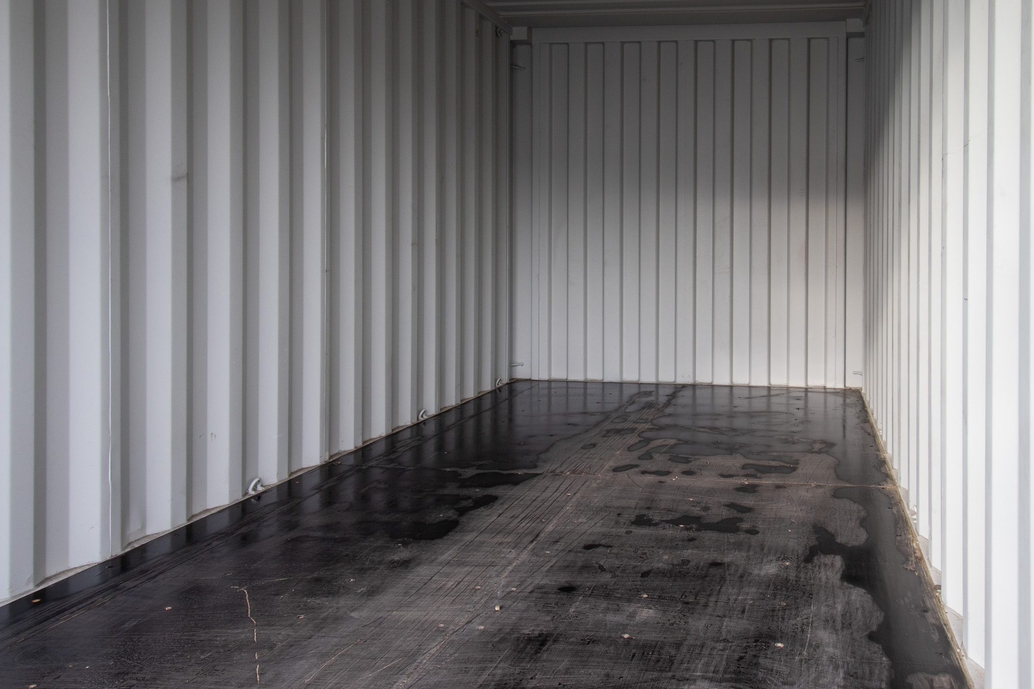 20’ New (1-trip) Container – Painted black - Custom Cubes