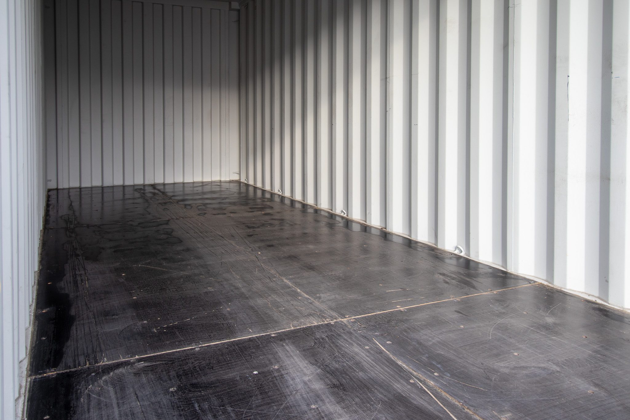 20’ New (1-trip) Container – Painted black - Custom Cubes