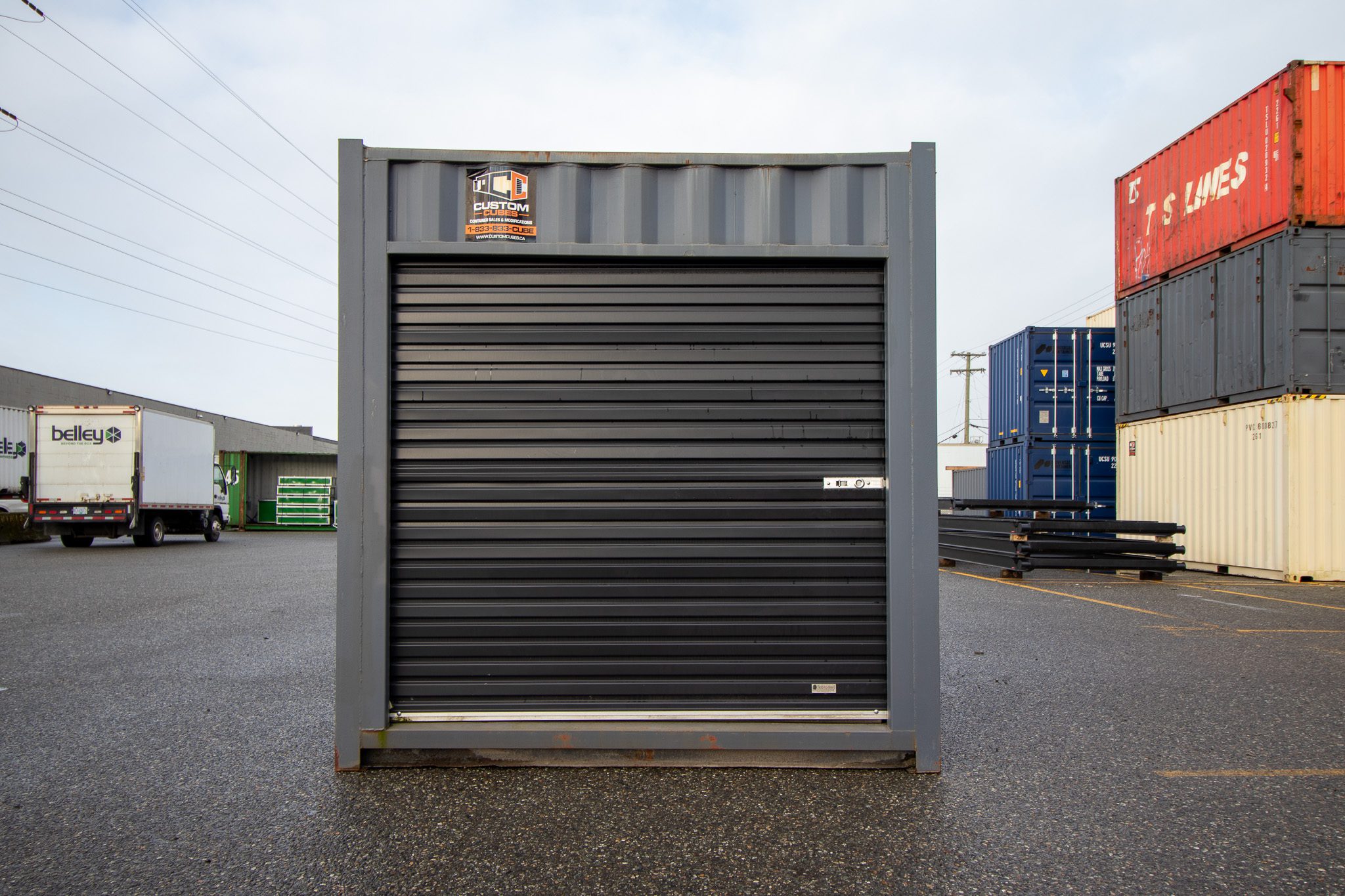 26′ Used Container with Roll up – Painted Grey - Custom Cubes